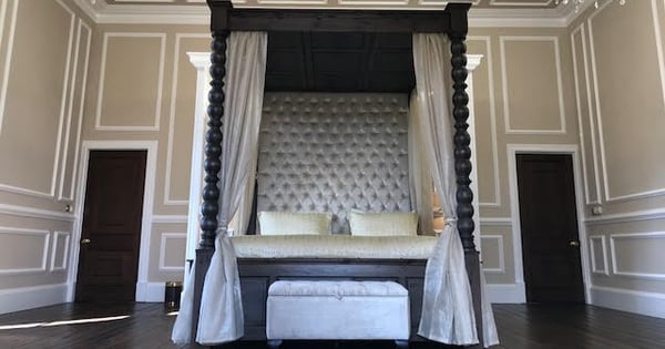 Tall Ambassador four-poster velvet headboard