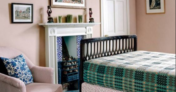 Country style bedrooms are colourful and play with clashing patterns