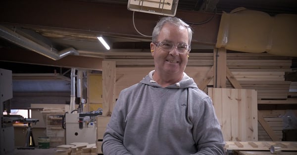 Happy craftsman at Revival Beds workshop