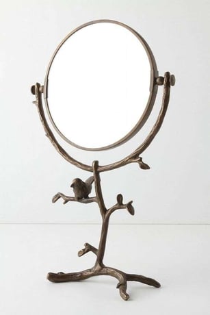 Bronze vanity stand mirror with branch an bird metal design