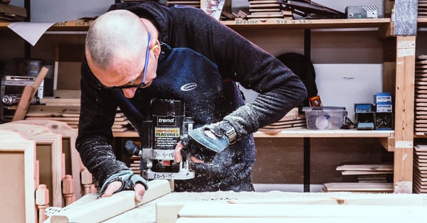 craftsmen from revival beds hand making custom-made beds