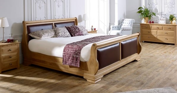 The Tuscany Sleigh Bed's curves create interior design fluidity